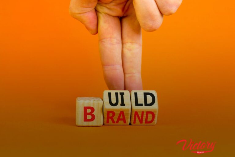 a wood pieces with a word "Build Brand"